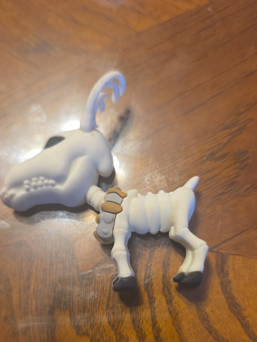 Disney White Skeletal Dog Figure with Gray Paws and Brown Collar Accents